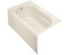 Kohler Devonshire K-1357-GLA-47 Almond 5' BubbleMassage Bath Tub with Integral Apron, Left-Hand Drain