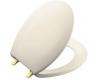 Kohler Bancroft K-4643-PB-47 Almond Round-Front Toilet Seat with Vibrant Polished Brass Hinges