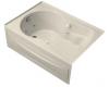 Kohler Synchrony K-1196-HL-47 Almond 5' Whirlpool Bath Tub with Integral Apron, Heater, Left-Hand Drain and Softgrip Grip Handles