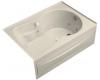 Kohler Synchrony K-1196-HR-47 Almond 5' Whirlpool Bath Tub with Integral Apron, Heater, Right-Hand Drain and Softgrip Grip Handles
