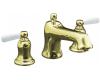 Kohler Bancroft K-T10592-4P-AF Vibrant French Gold Deck-Mount Bath Faucet Trim with White Ceramic Lever Handles